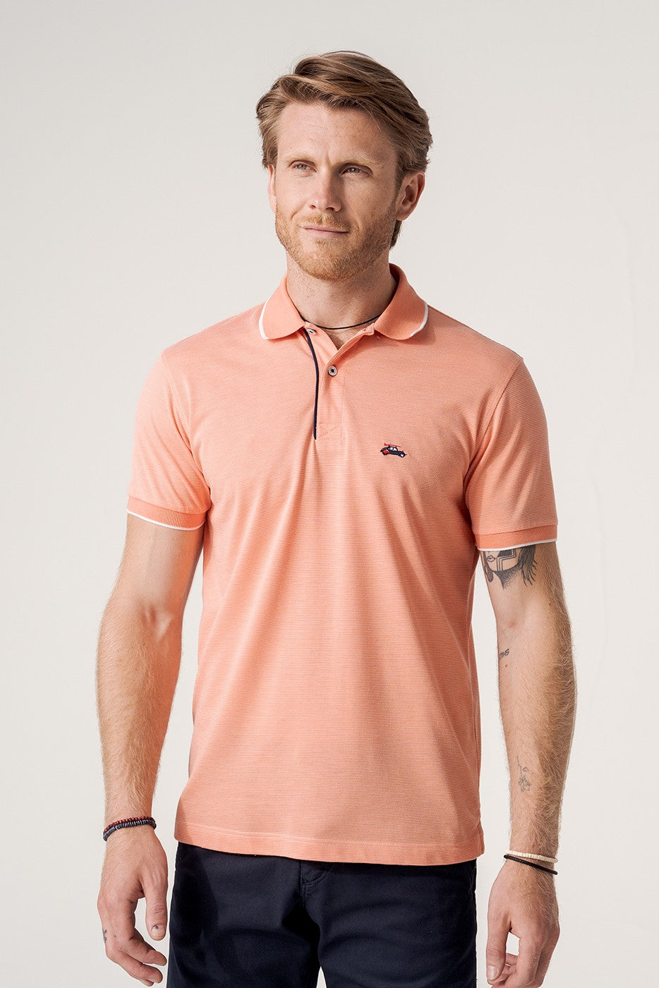 Polo coral manga corta con cuello botón