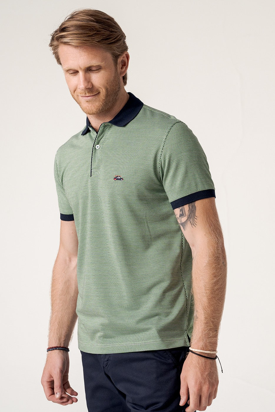 Polo jacquard textura manga corta color verde y marino
