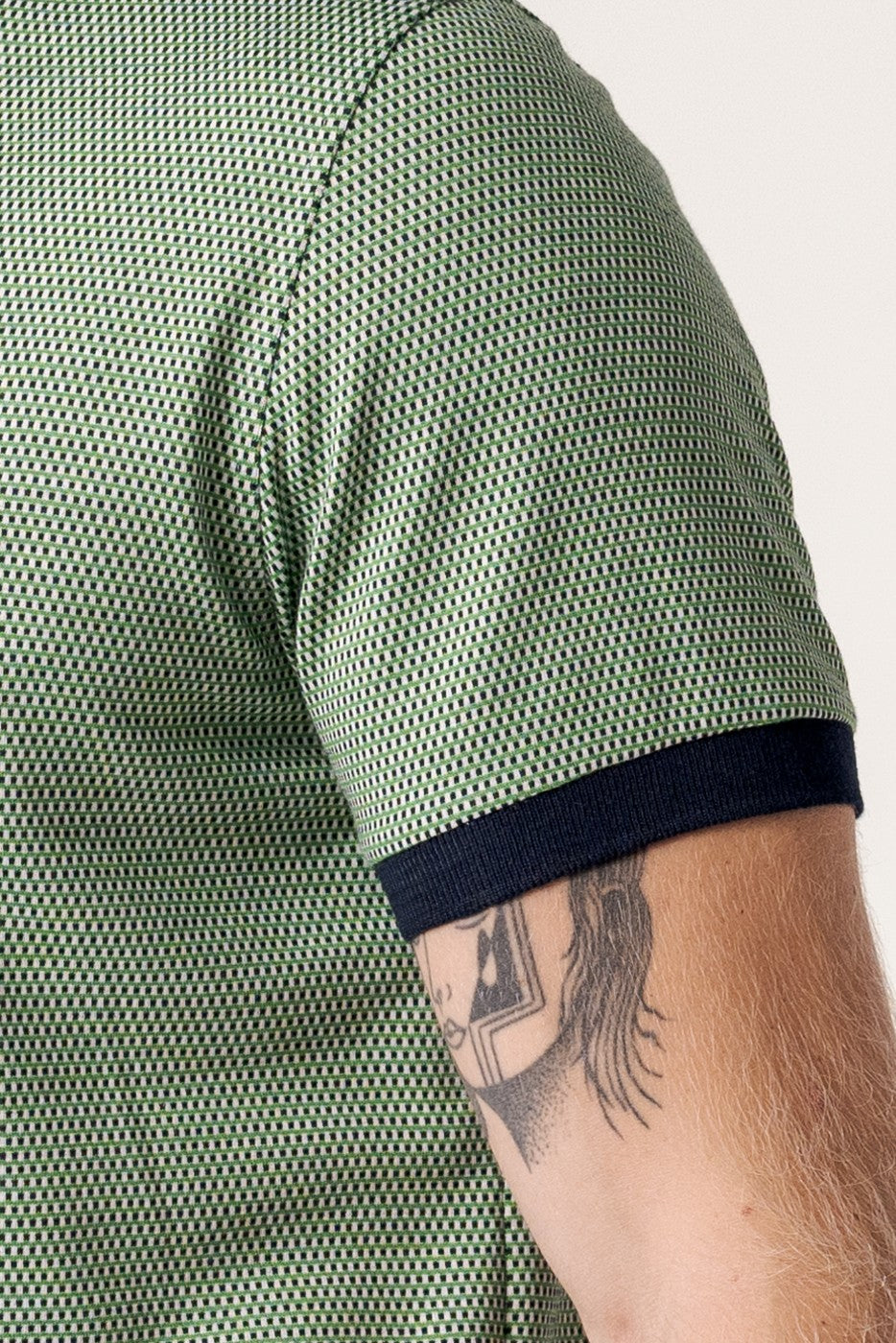 Polo jacquard textura manga corta color verde y marino