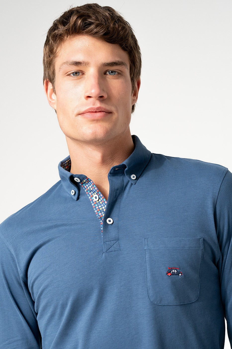 Polo hombre de punto manga larga con bolsillo azul