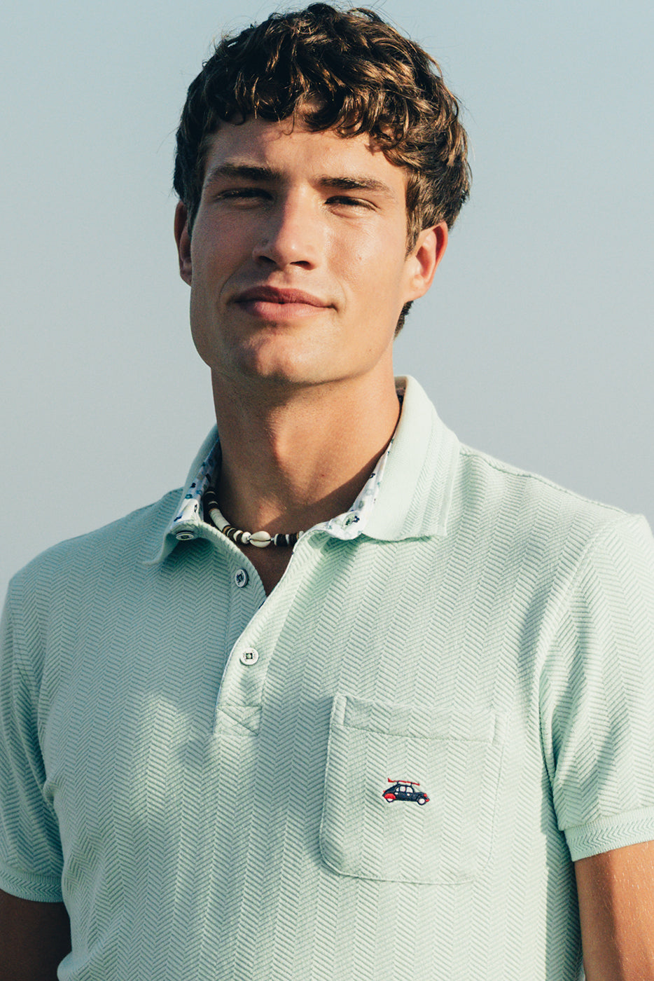 Polo hombre turquesa con bolsillo