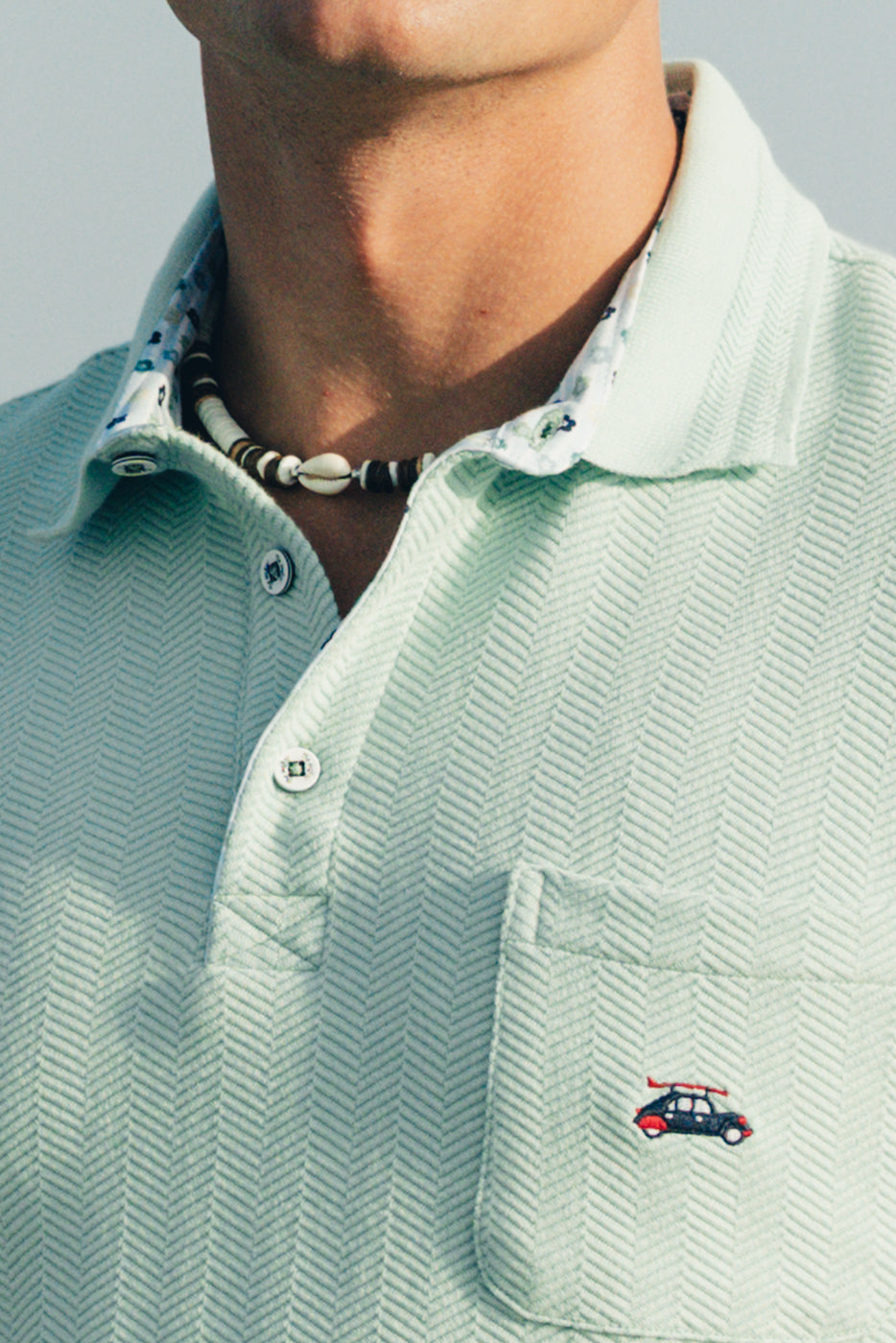 Polo hombre turquesa con bolsillo